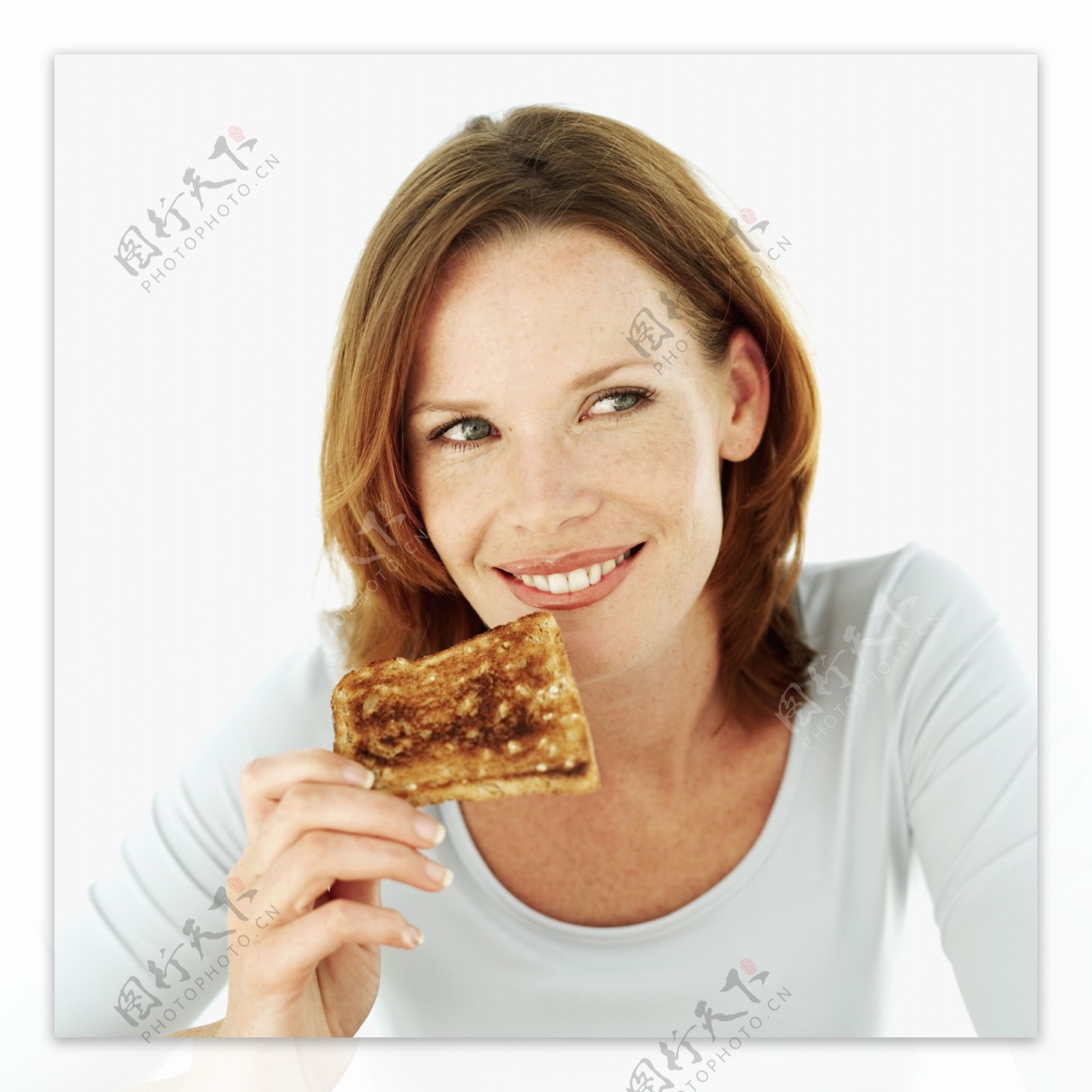吃面包的女人图片