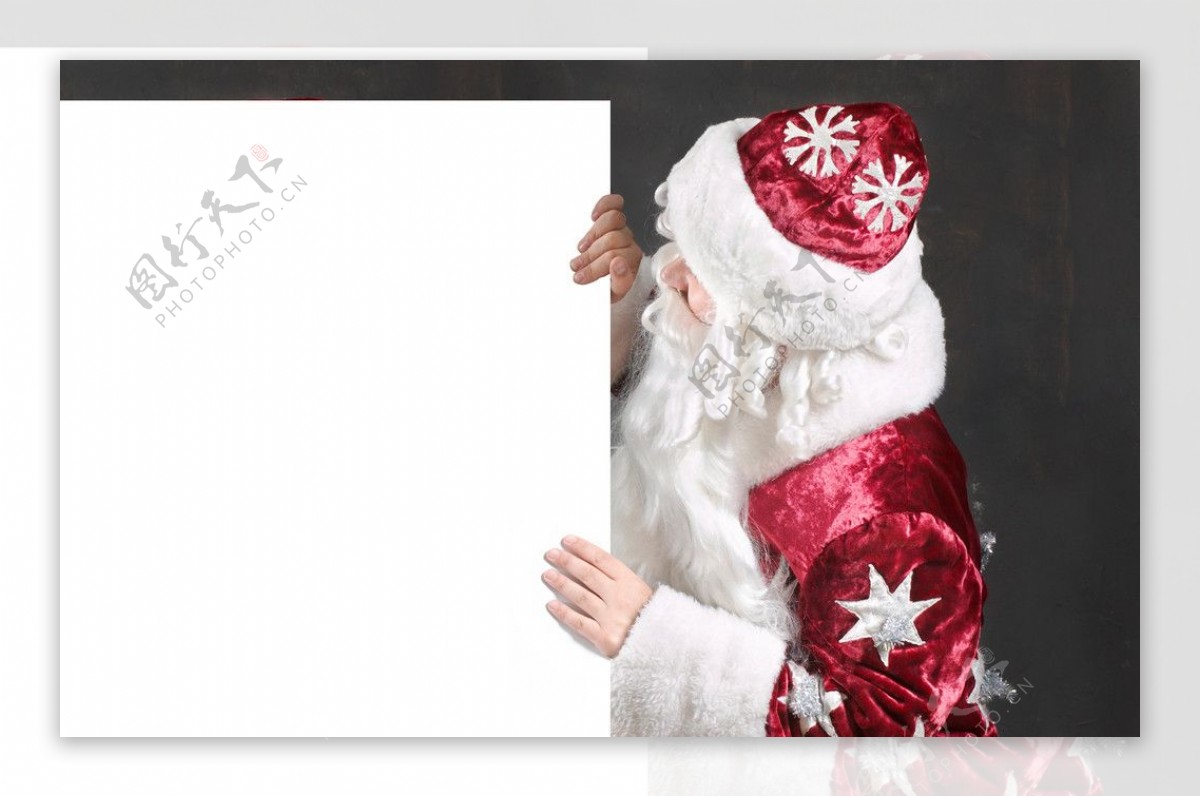 看广告牌的圣诞老人图片