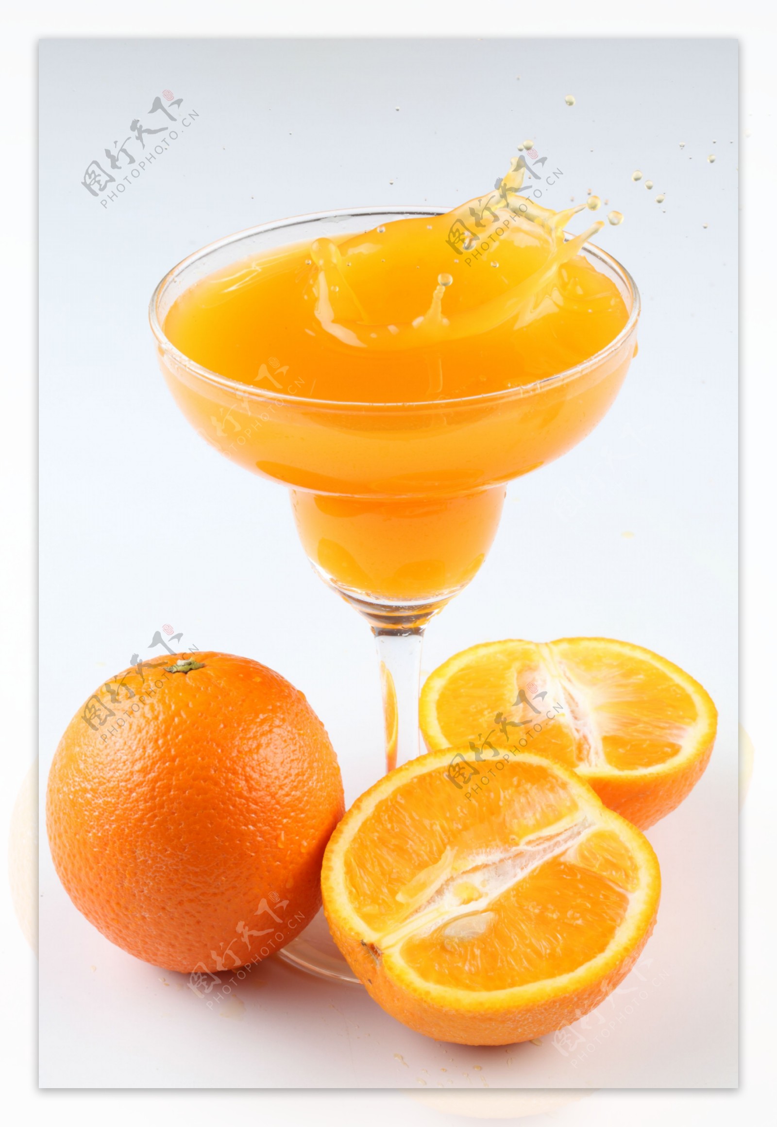 橙汁饮料摄影图片