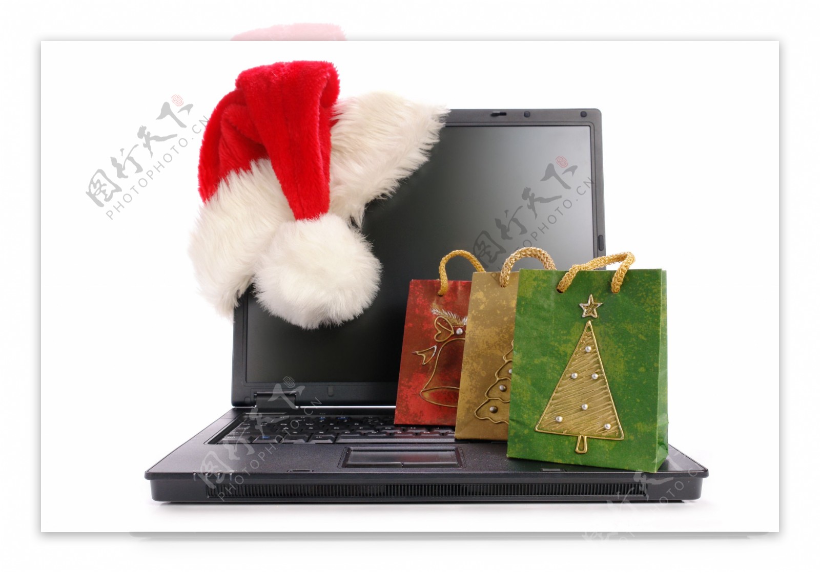 圣诞购物袋与电脑