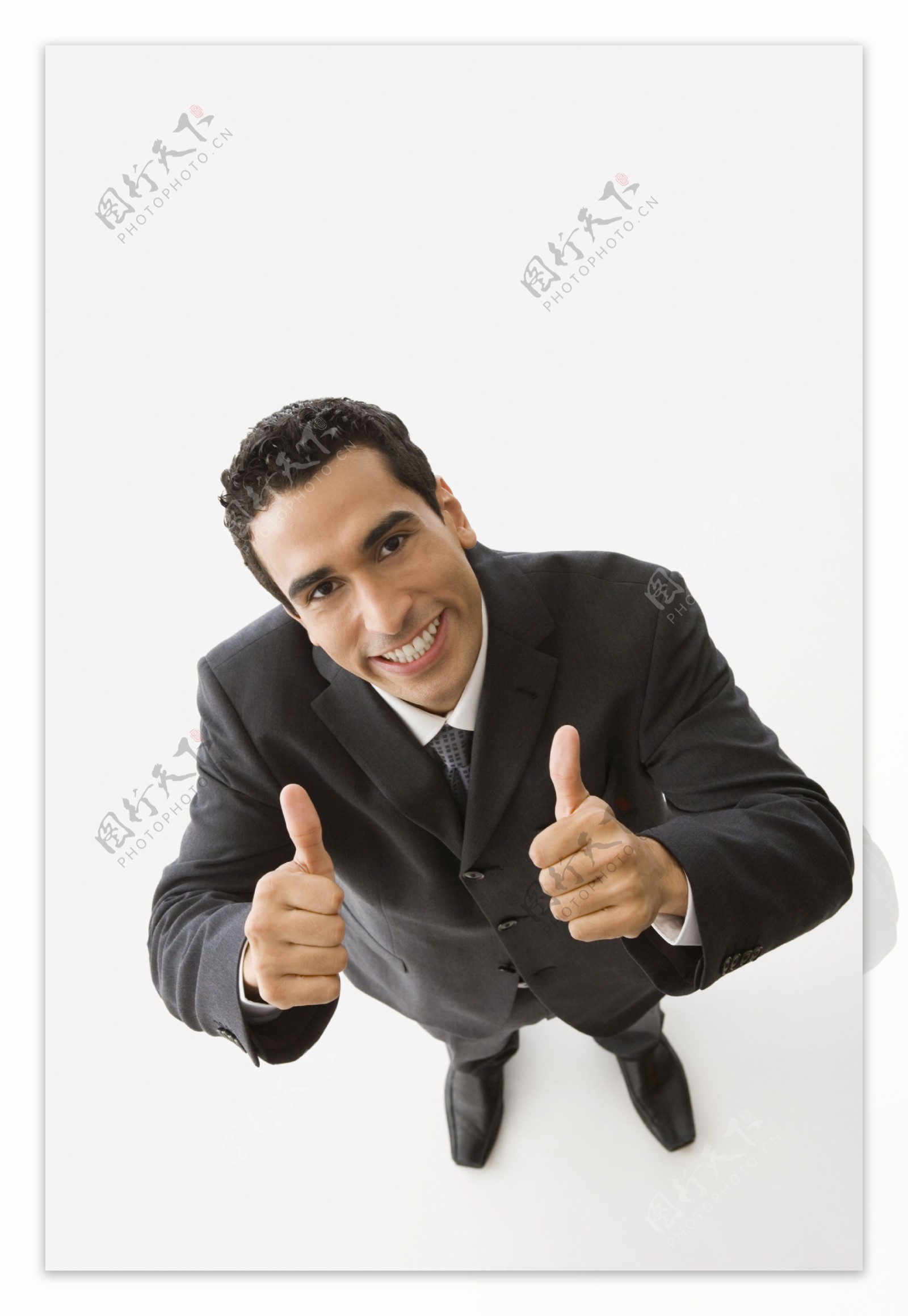 竖大拇指的商务男性图片