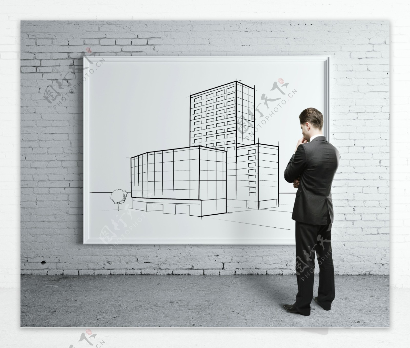 建筑图纸与商务男士图片